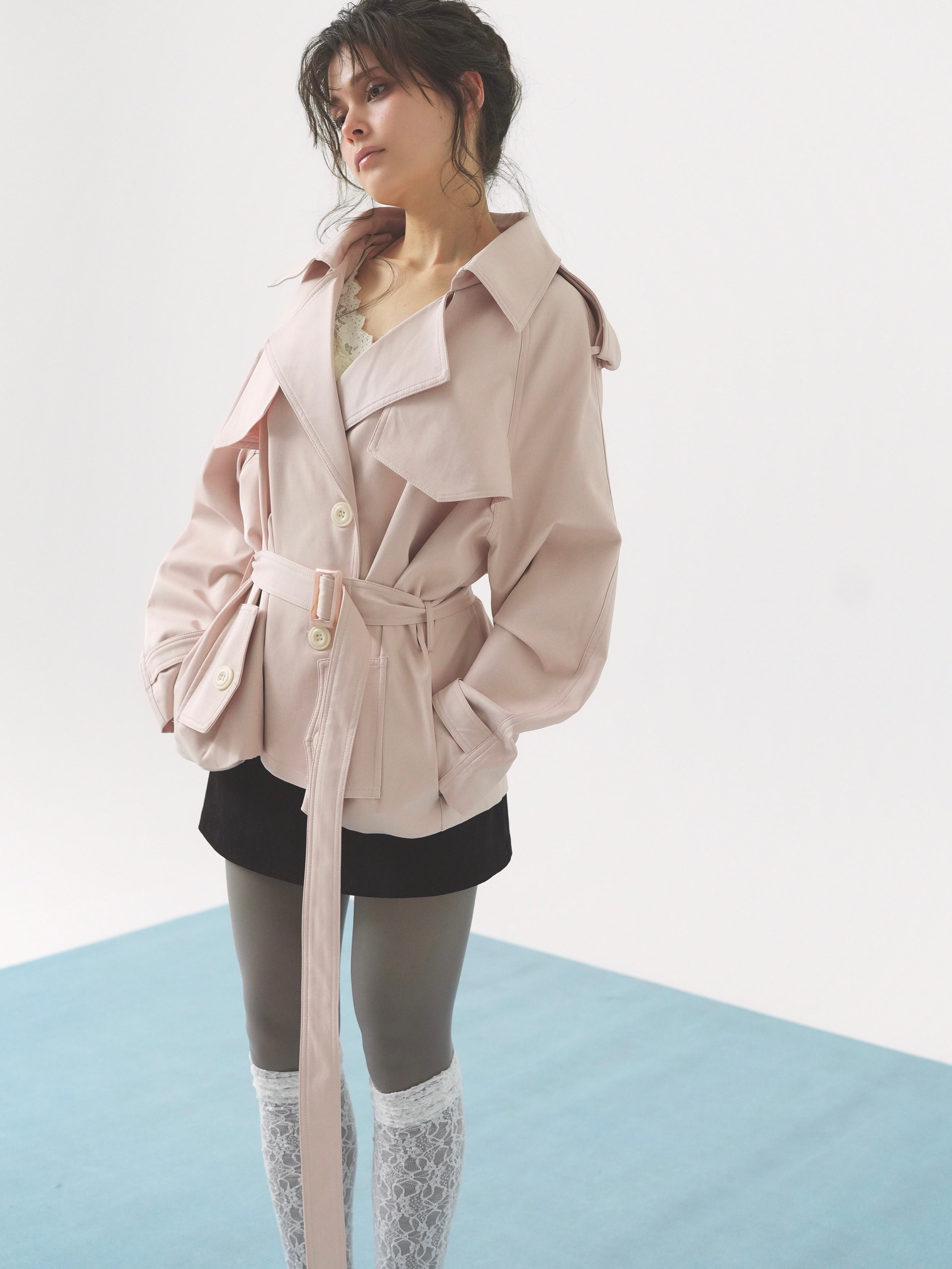 pale short trench coat