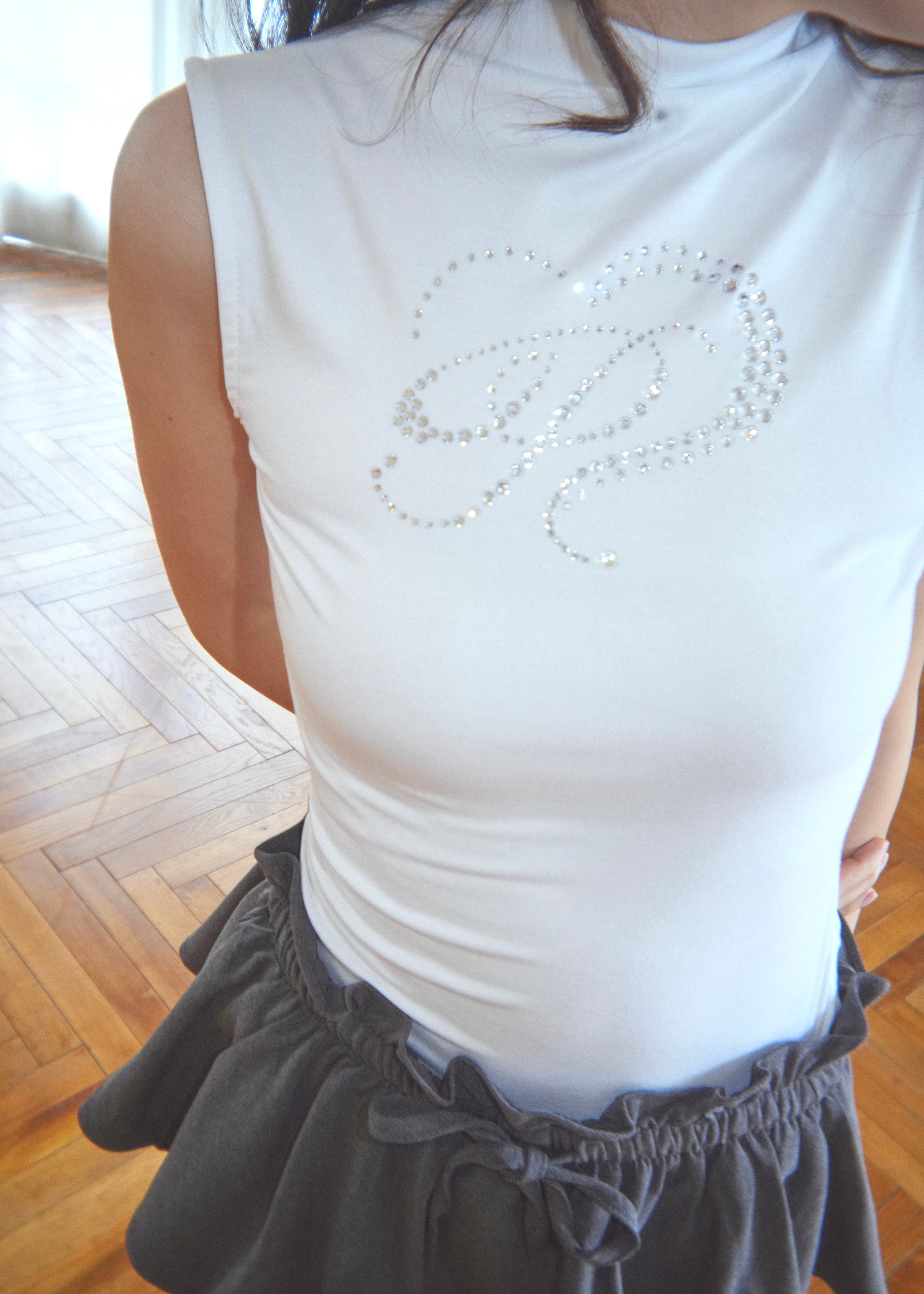motif sleeveless top｜PELLICULE | ぺリキュール