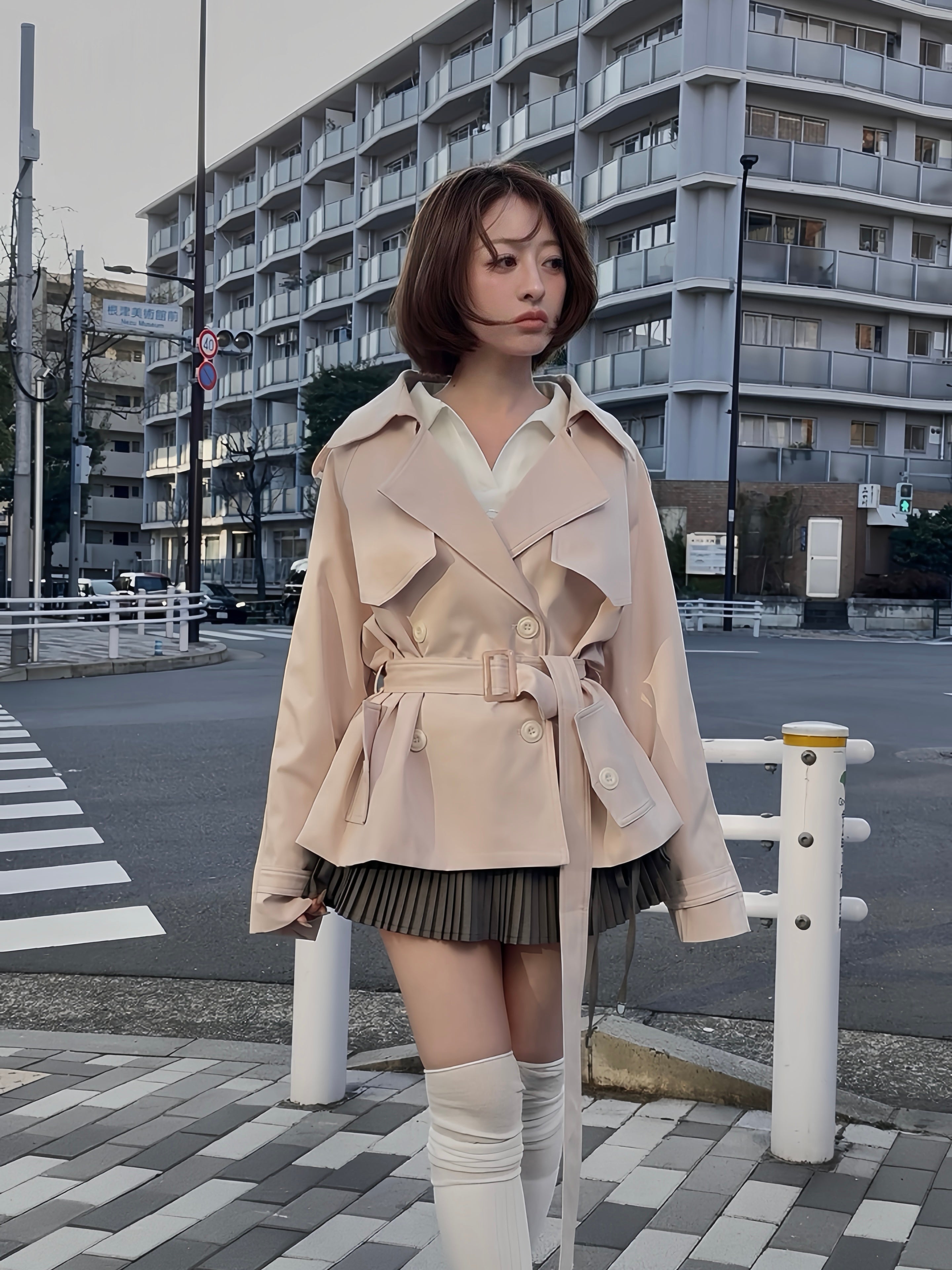 pale short trench coat